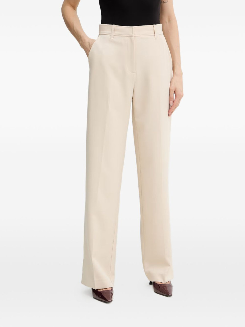 pressed-crease tailored trousers 1