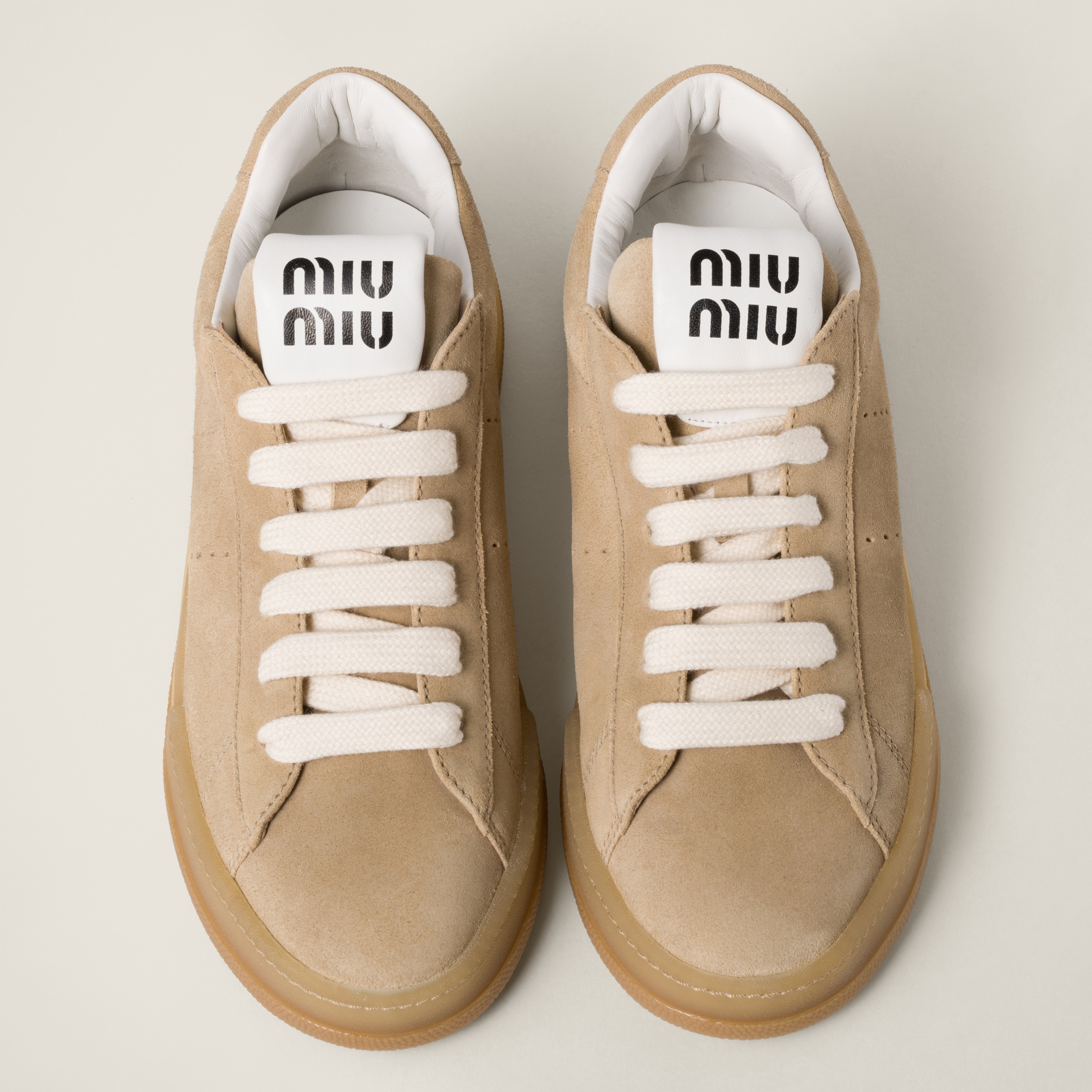 Miu Miu Bleached suede sneakers | miumiu | REVERSIBLE