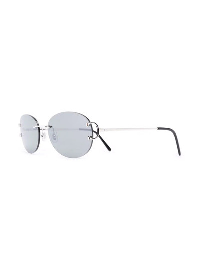 Cartier logo-engraved oval sunglasses outlook