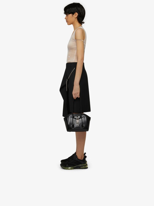 ASYMMETRICAL WRAP SKIRT WITH METALLIC DETAILS - 3