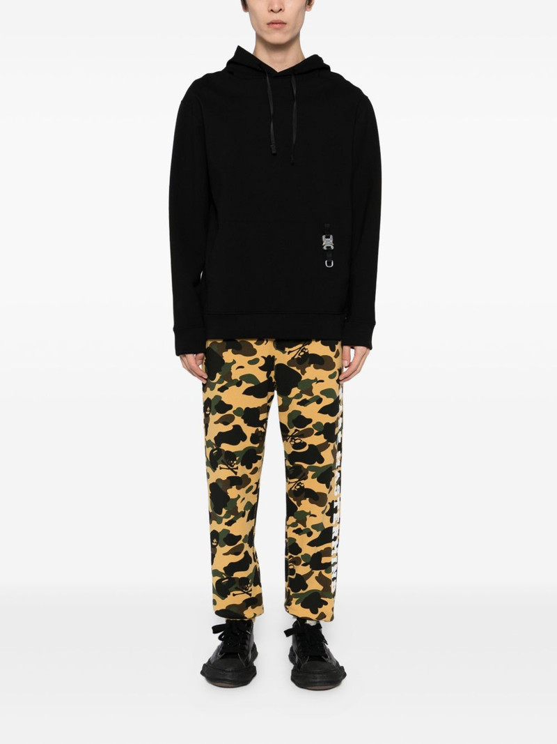 mastermind JAPAN graphic-print trousers outlook
