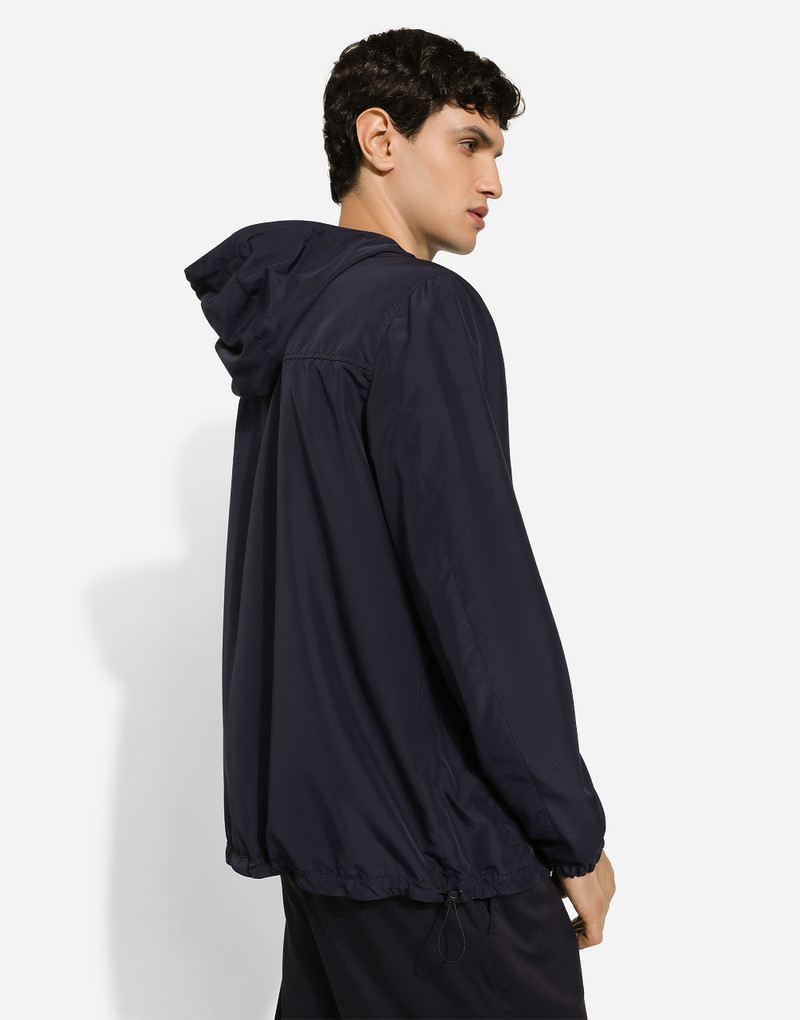Reversible jacket with hood and logo 4