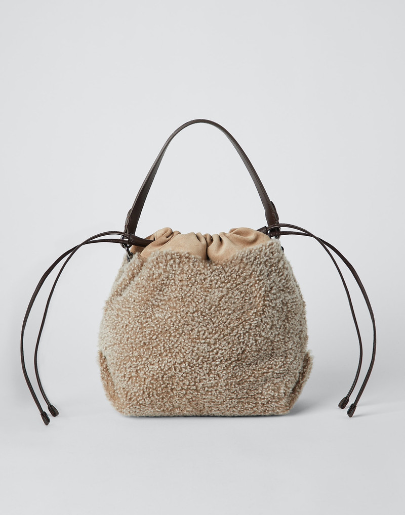 Curly shearling and suede bucket bag with monili 1