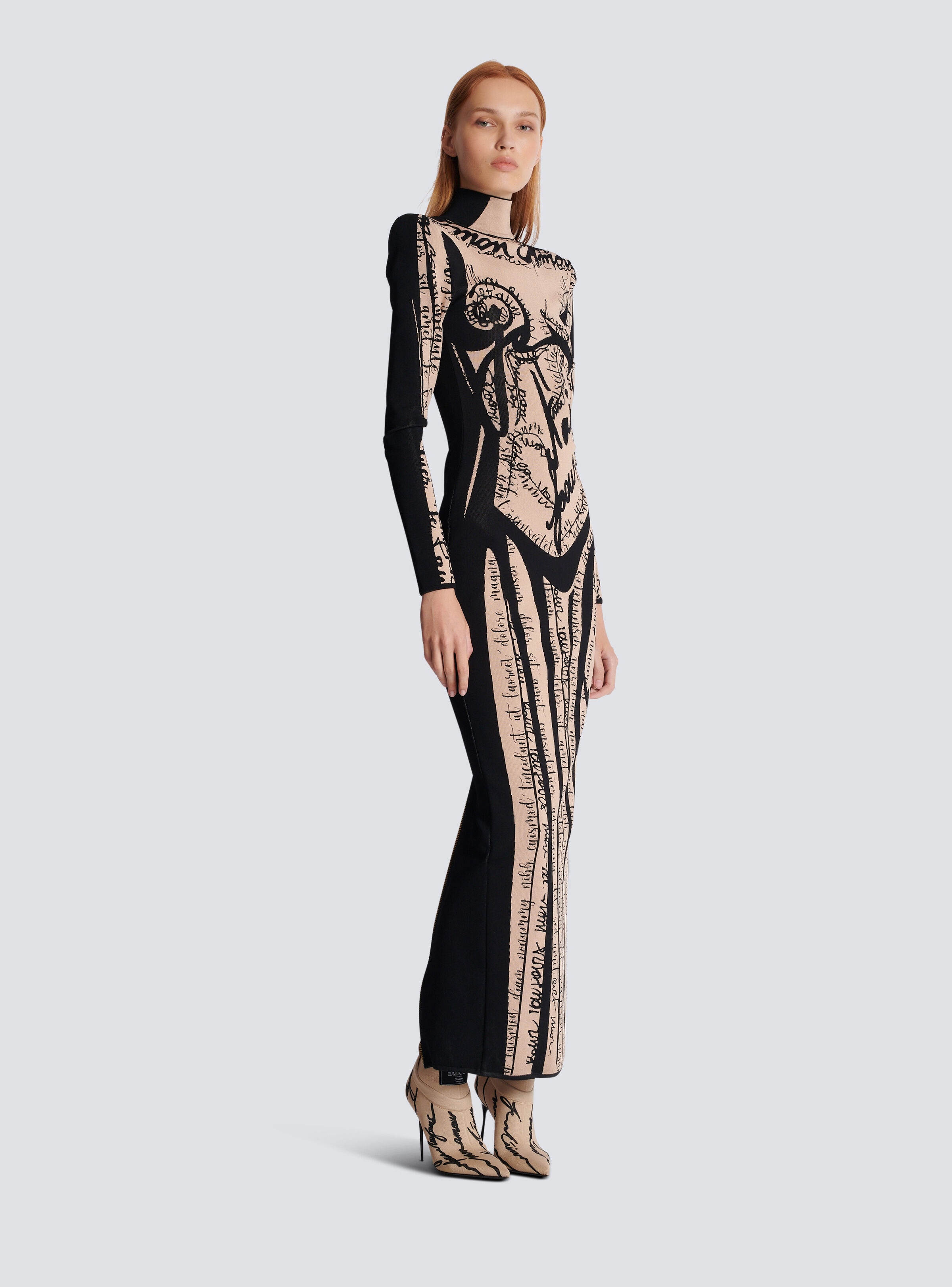 Long knit dress with body motif - 3