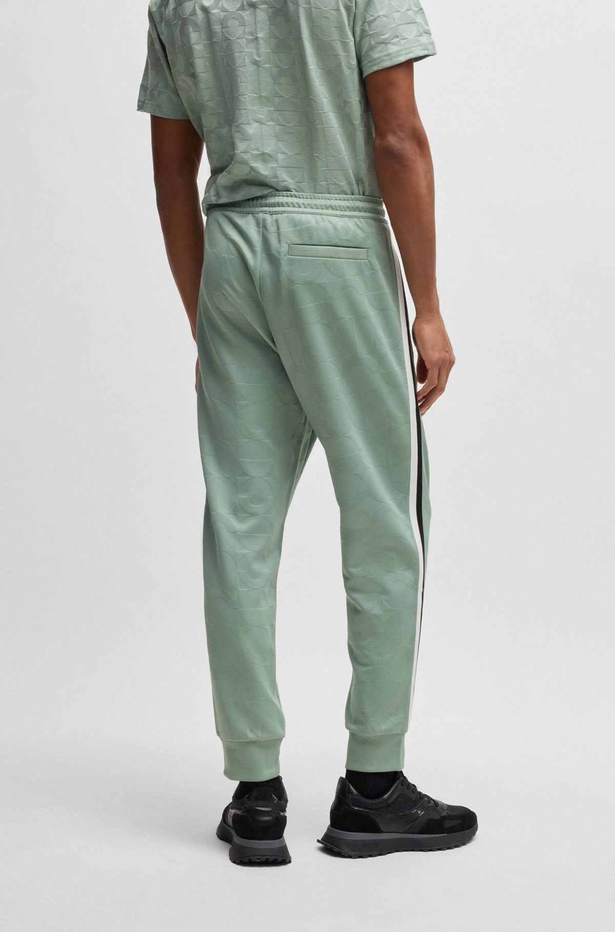 RELAXED-FIT TRACKSUIT BOTTOMS WITH JACQUARD-WOVEN CIRCLES - 5
