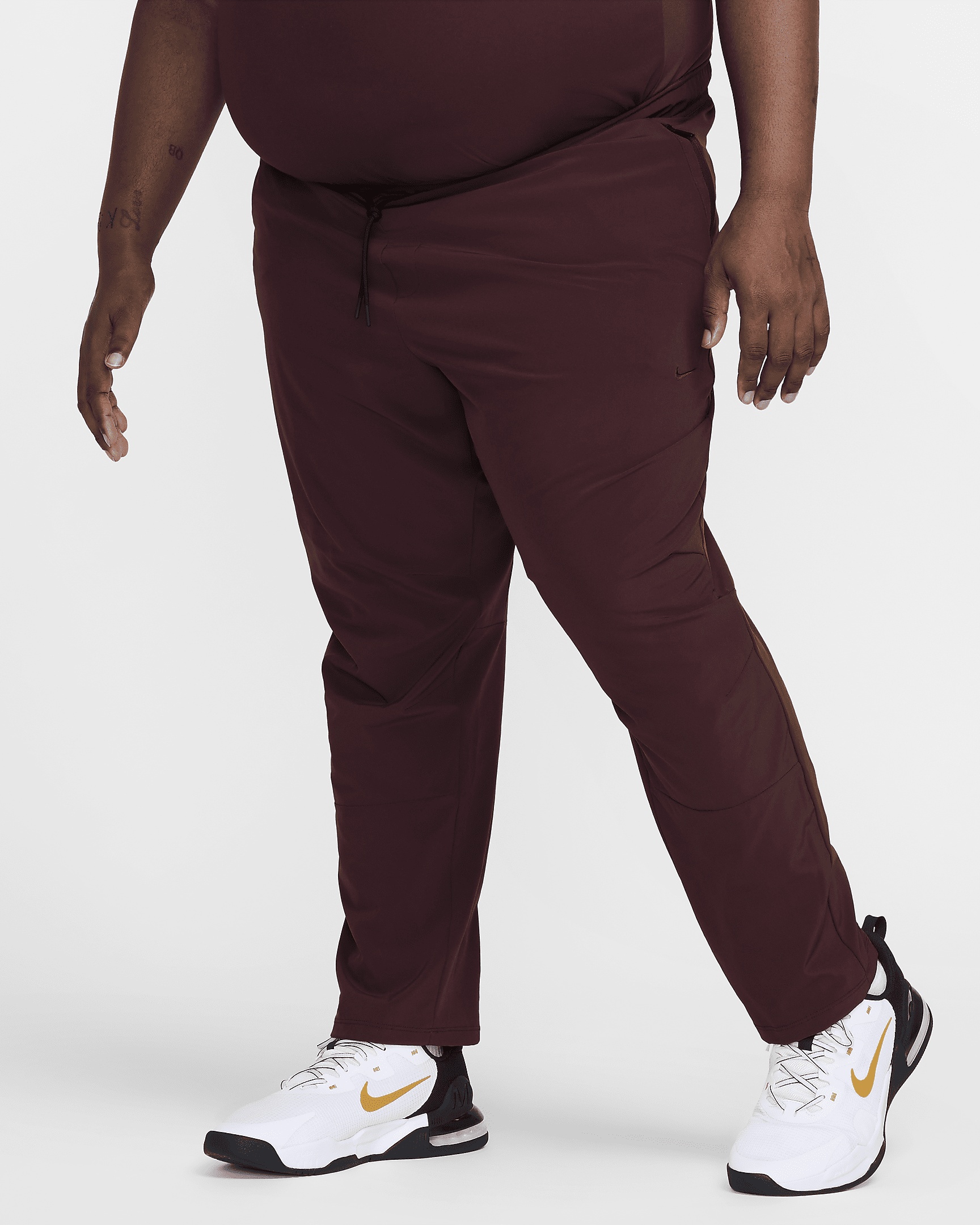 Nike Unlimited Men's Dri-FIT Tapered Leg Versatile Pants - 7