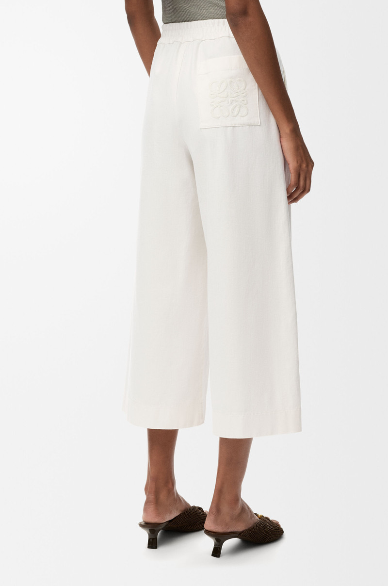 Cropped trousers in denim 4