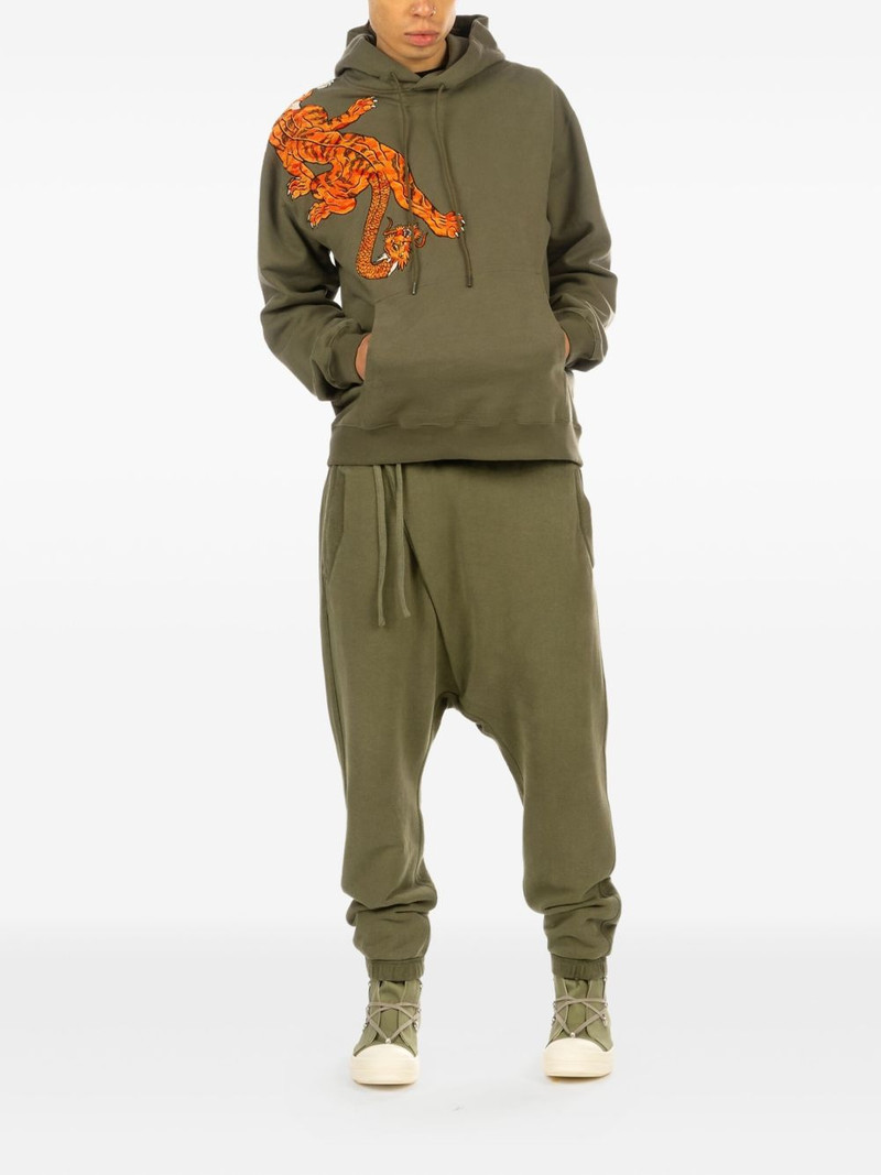 MAHARISHI Kesagiri asymmetrical track pants outlook