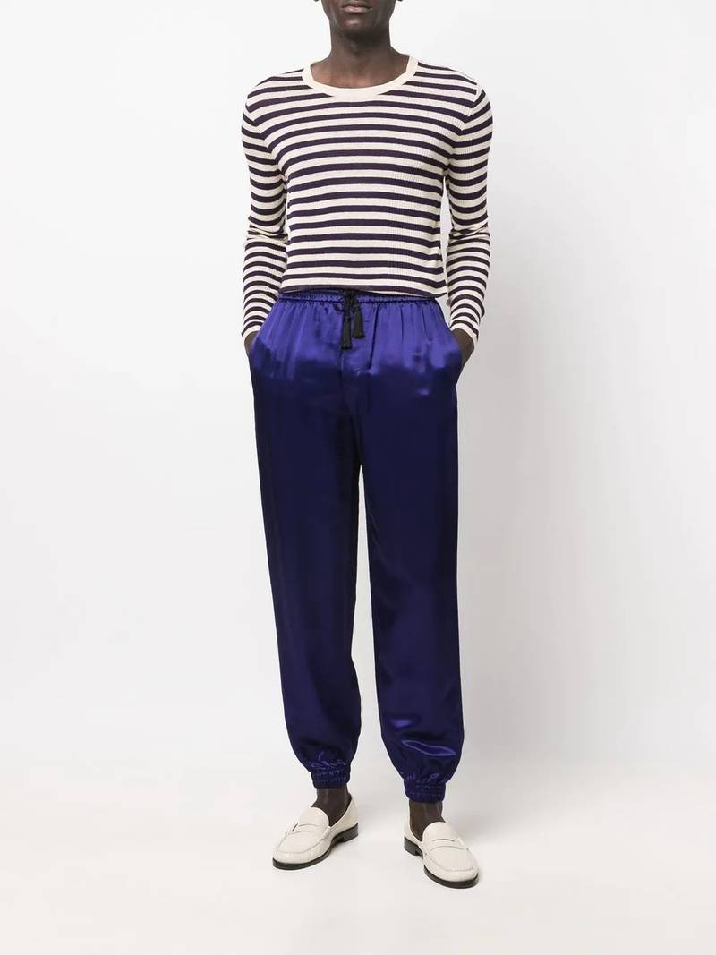 SAINT LAURENT tapered-leg silk trousers outlook