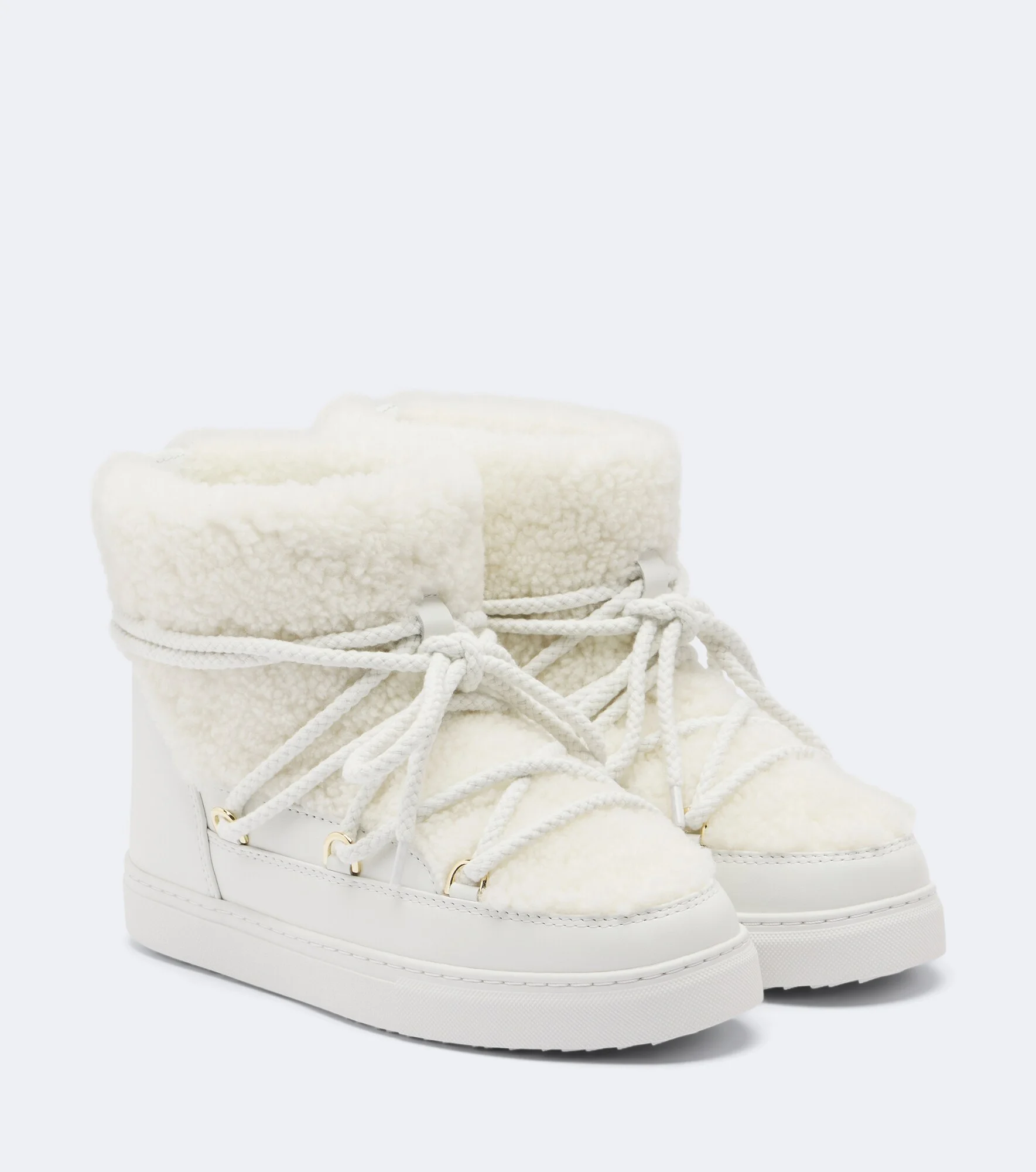 Curly shearling and leather snow boots - 1