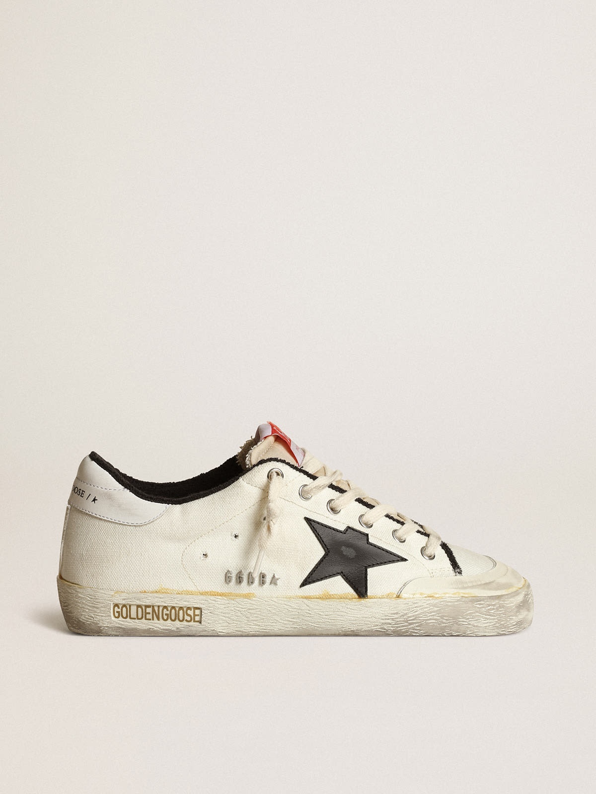 Women’s Super-Star LTD sneakers in beige canvas with black leather star and white leather heel tab - 1