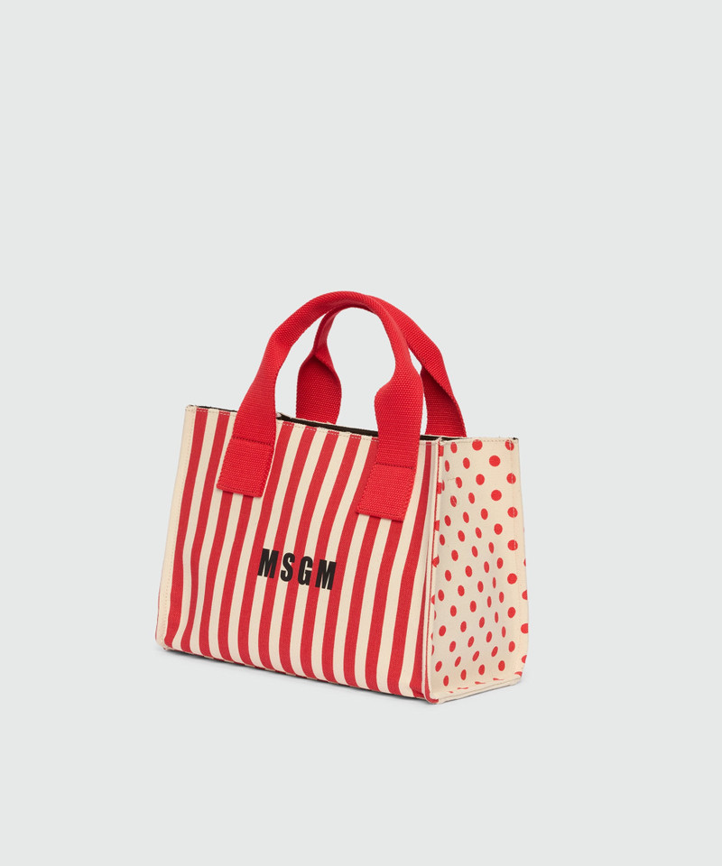 Small canvas tote with polka dot and stripe print. 4
