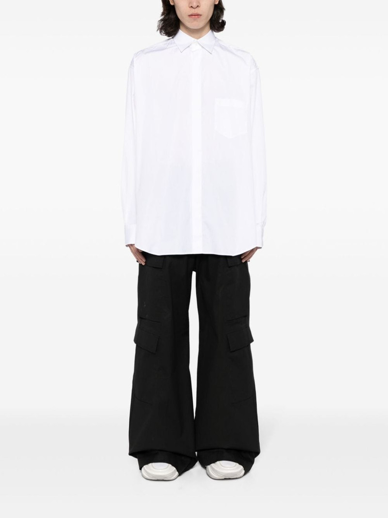 VETEMENTS logo-tag cotton shirt outlook