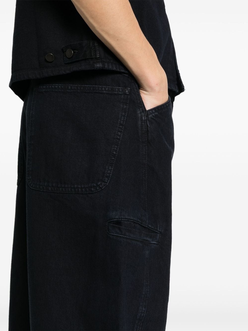 Twisted tapered-leg jeans - 5