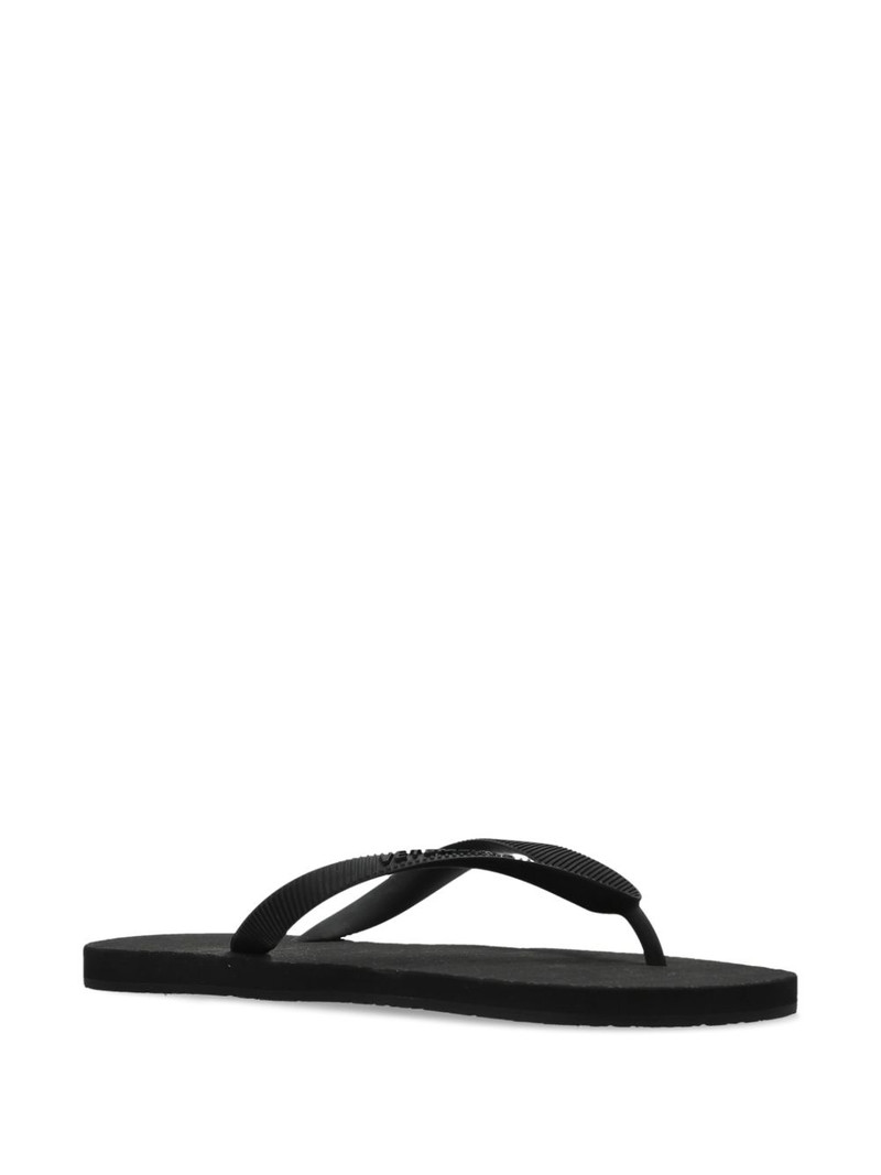 VETEMENTS embossed logo flip flops outlook