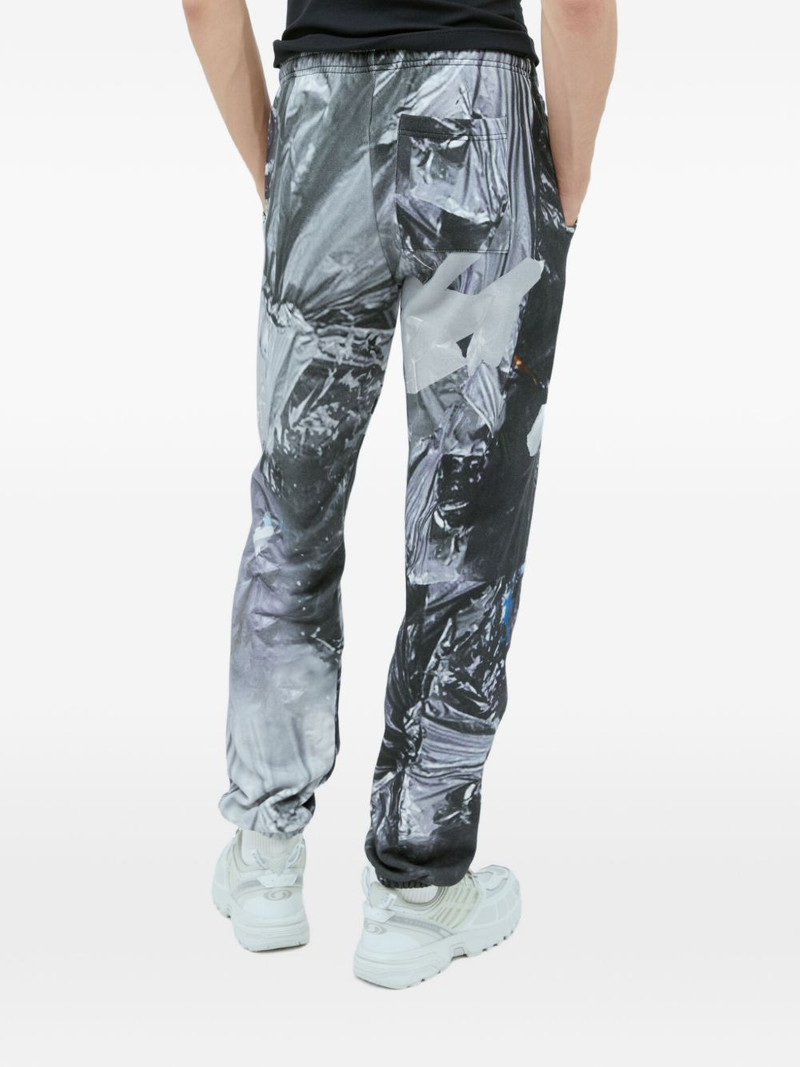 Garbage graphic-print track pants 4