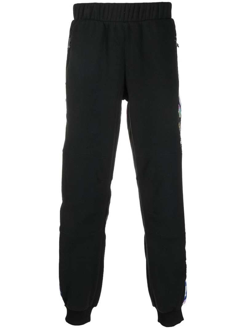 graphic-print panelled track pants 1