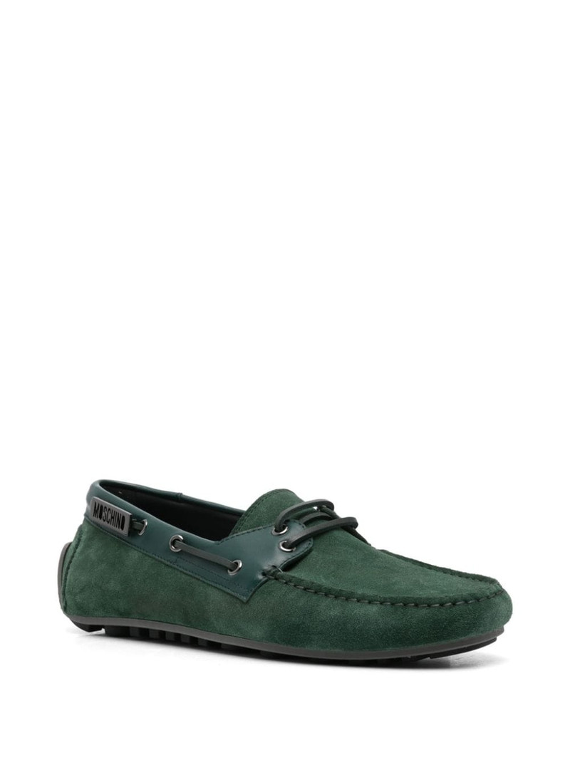 Moschino logo-plaque boat shoes outlook
