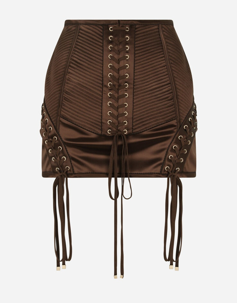 Satin miniskirt with laces and eyelets 1