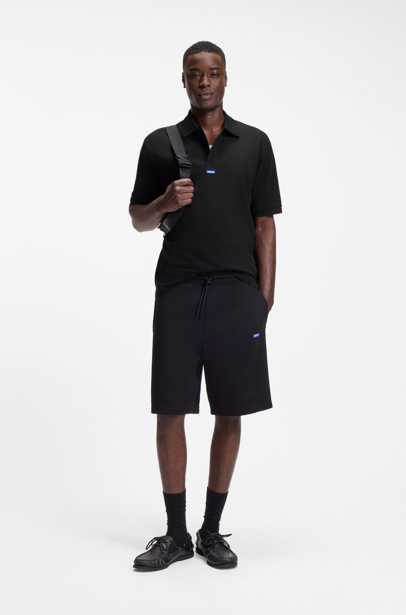 HUGO COTTON-PIQUÉ POLO SHIRT WITH BLUE LOGO BADGE outlook