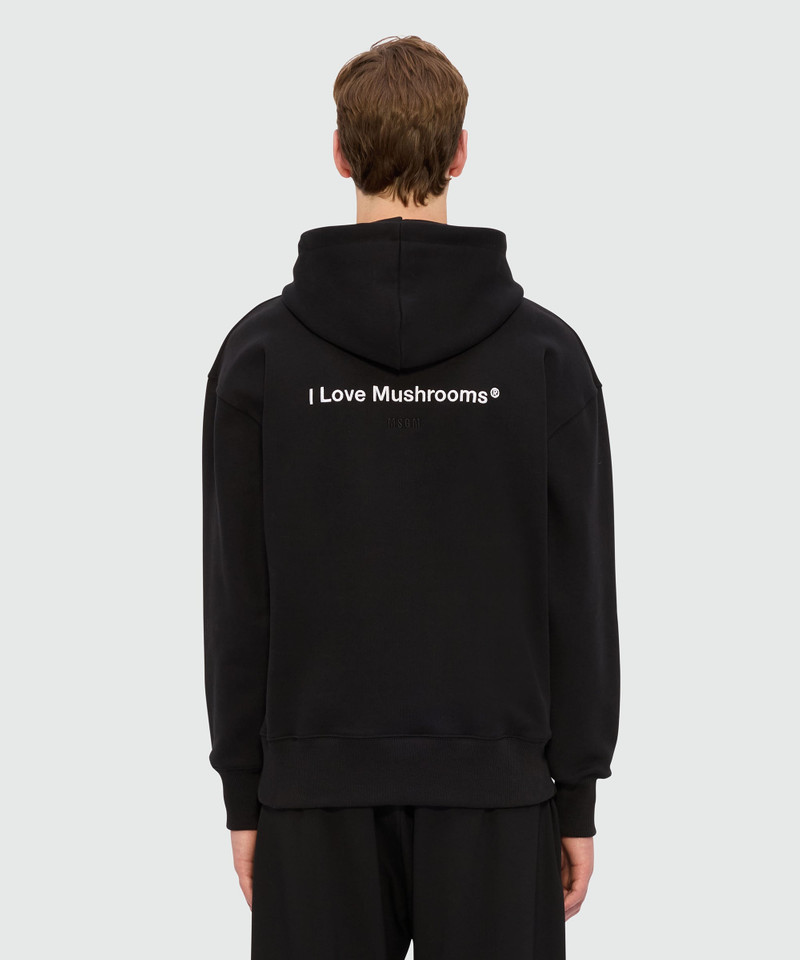 Black jersey hoodie with "I Love Mushrooms" patch and quote 3