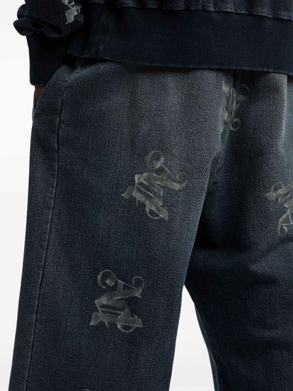 monogram-print elasticated jeans - 6