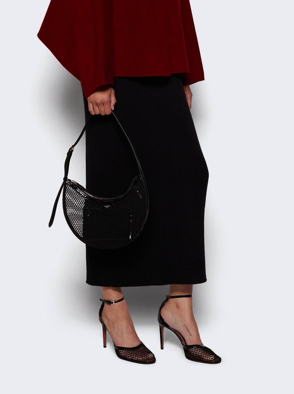 Alaïa One Piece Demi Lune Bag In Fishnet Black | thewebster