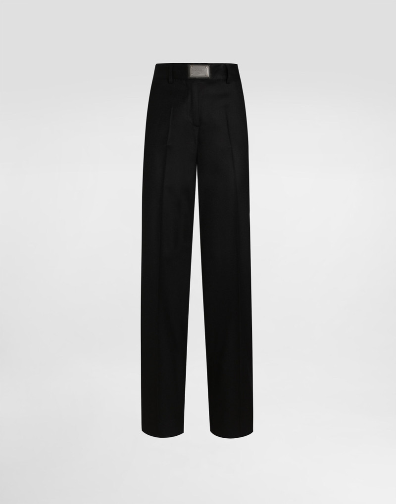 Flared flannel pants with logo tag 1