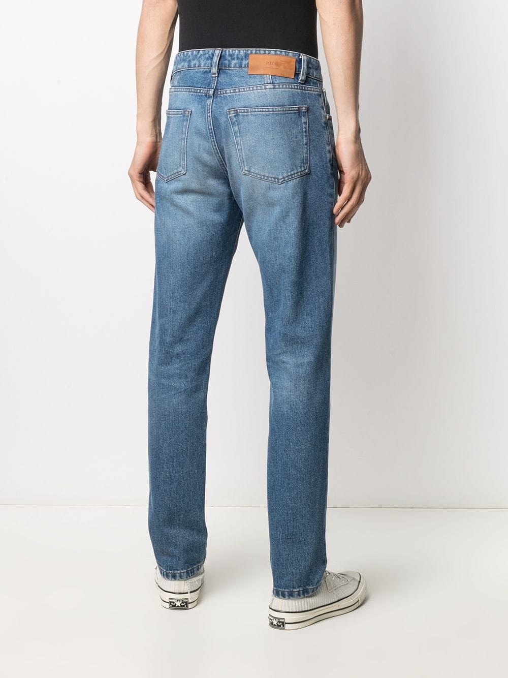 straight-leg mid wash jeans - 4