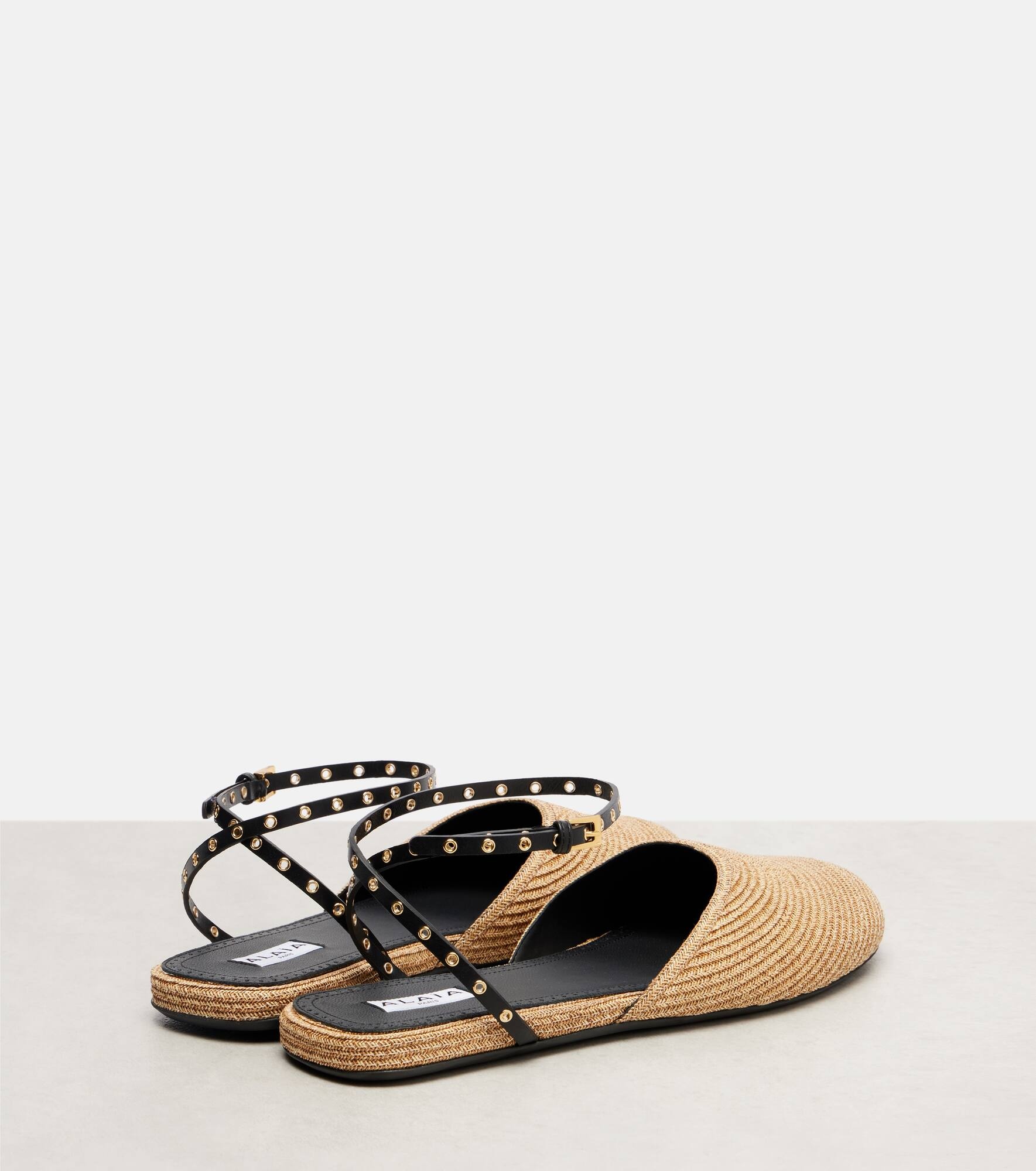Leather-trimmed raffia flats - 2