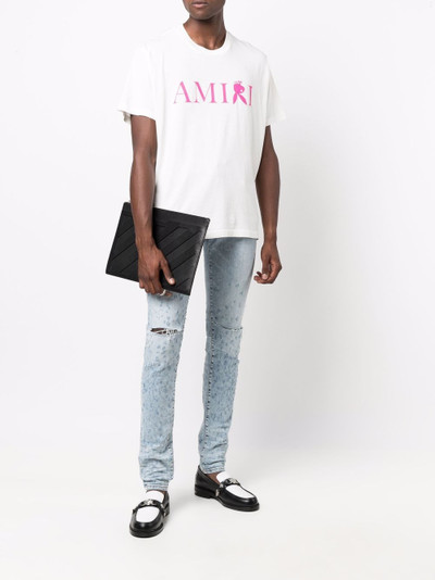 AMIRI Shotgun distressed skinny jeans outlook