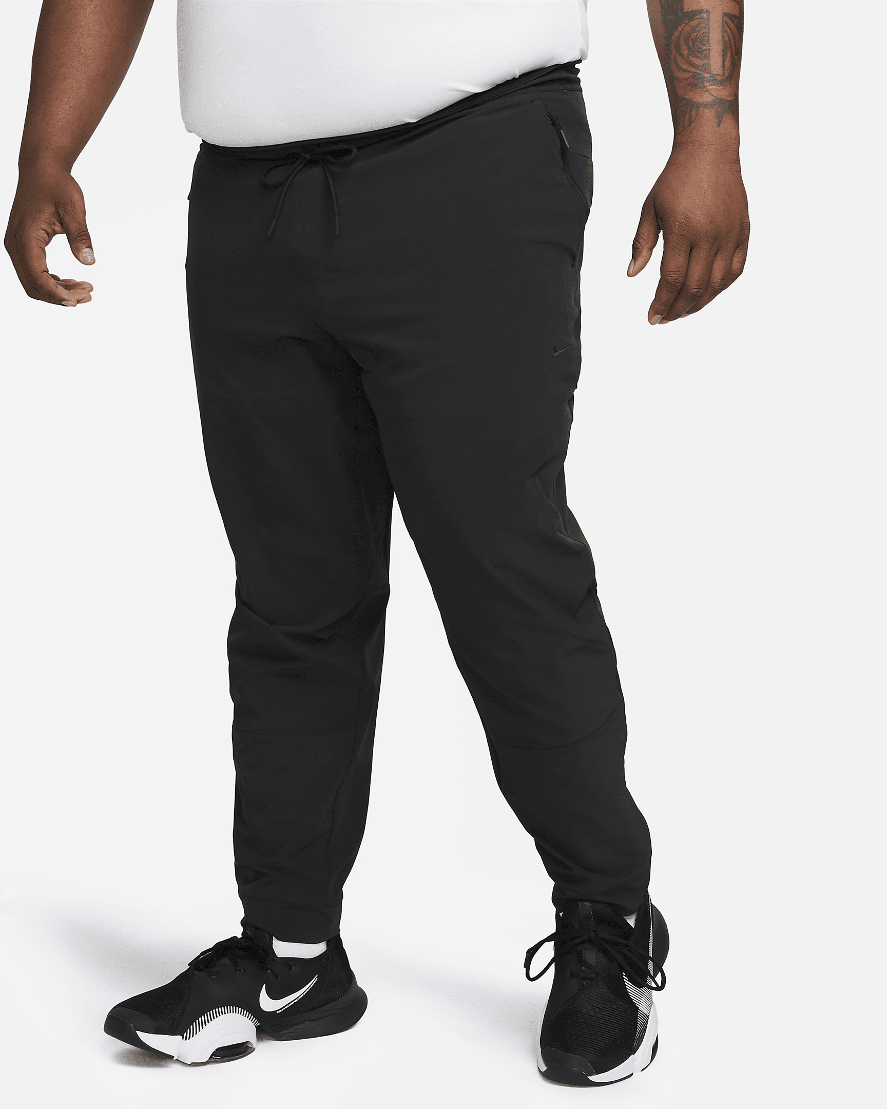Nike Unlimited Men's Dri-FIT Zippered Cuff Versatile Pants - 8