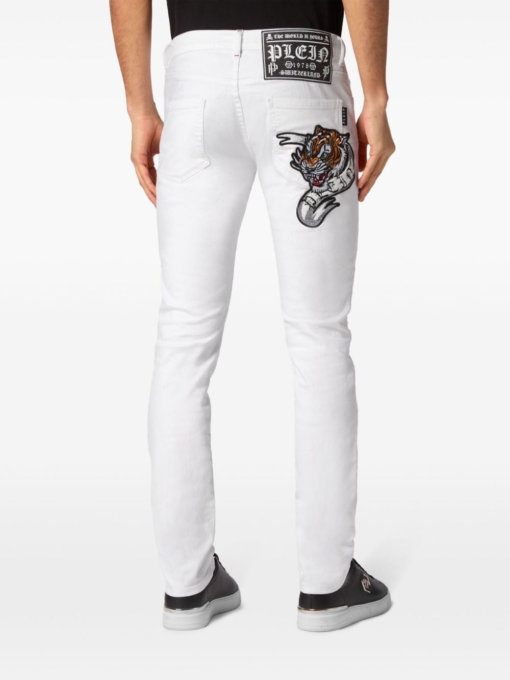 tiger-appliquÃ© straight-leg jeans - 3