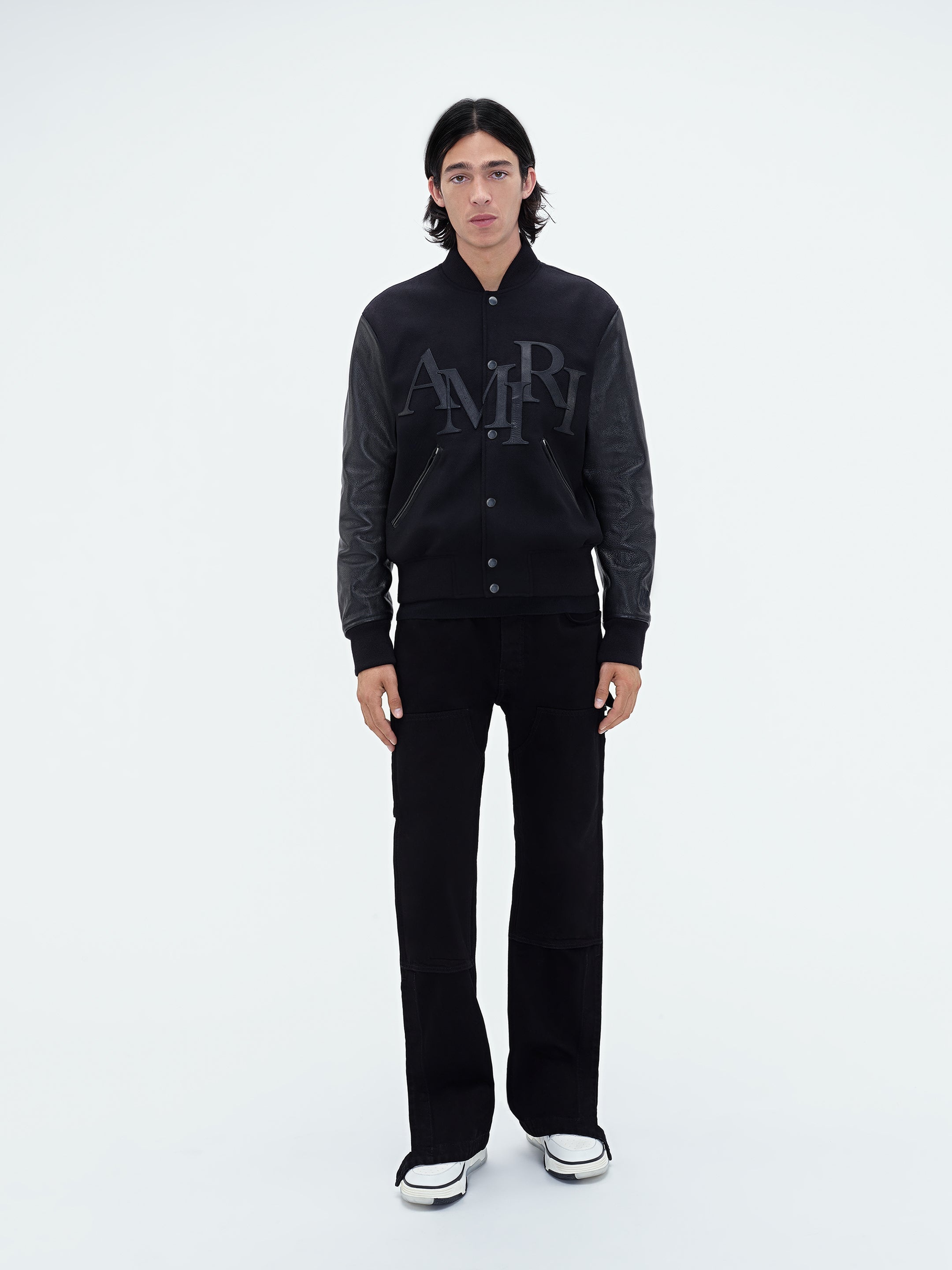 ブラック Amiri Staggered フーディ AMIRI Men's Staggered Logo Varsity Jacket in Black Amiri