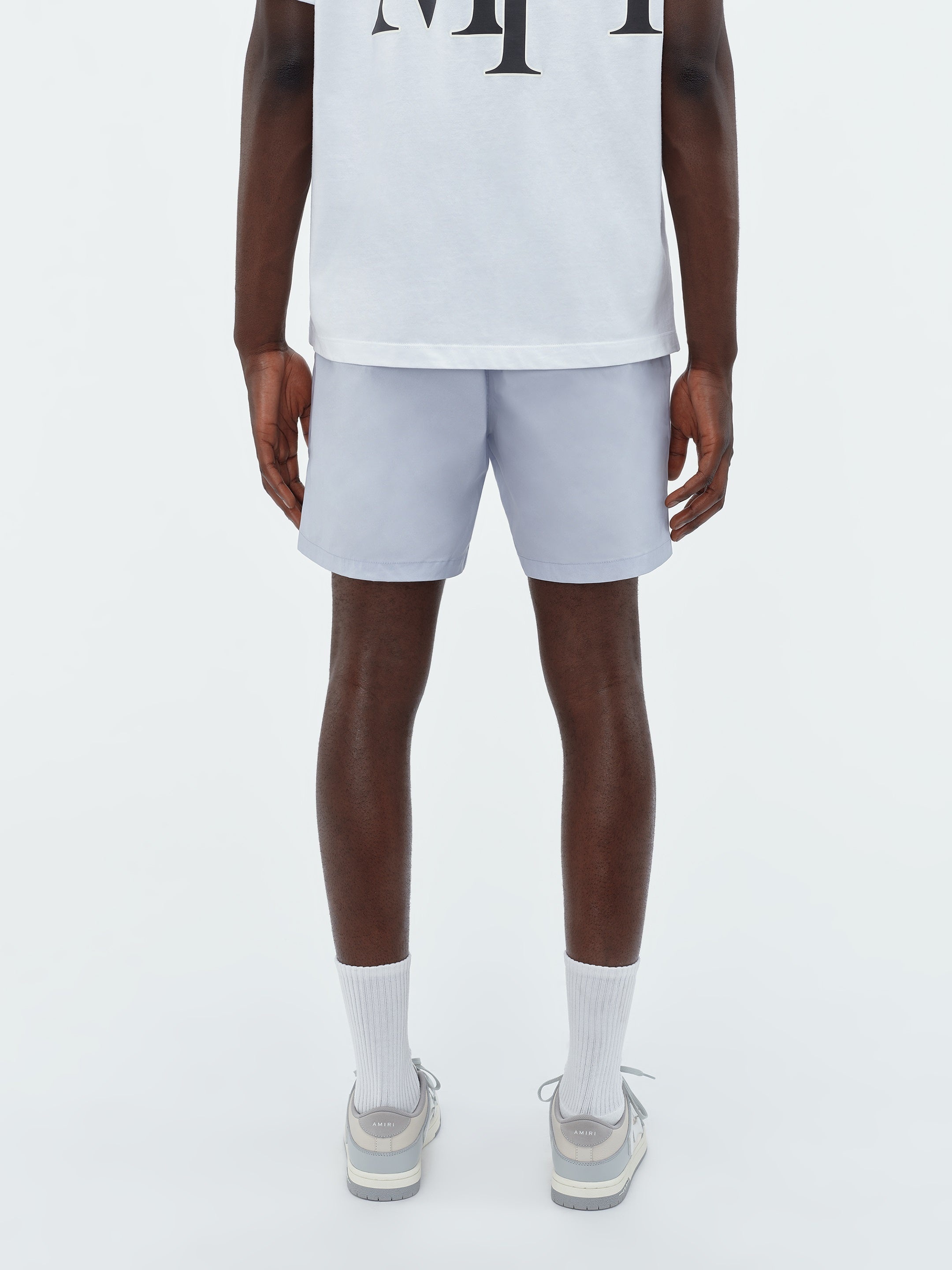 AMIRI STACK LOGO SWIM TRUNK - 5