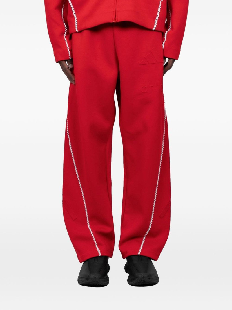x Arte Antwerp embossed-trim track pants 3