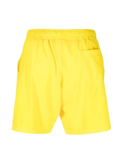 Moschino logo plaque swim shorts outlook