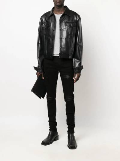 AMIRI distressed-finish ripped skinny jeans outlook