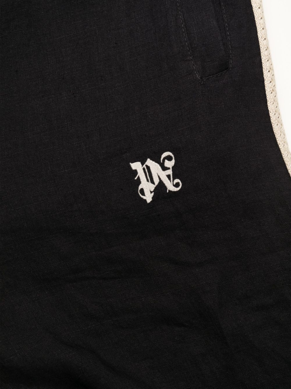 logo-embroidered linen trousers - 6