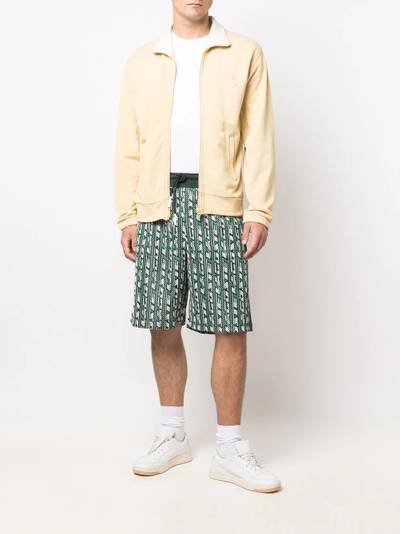 LACOSTE perforated all-over logo print shorts outlook