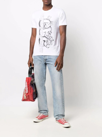 Comme Des Garçons x Kaws logo-print T-shirt outlook