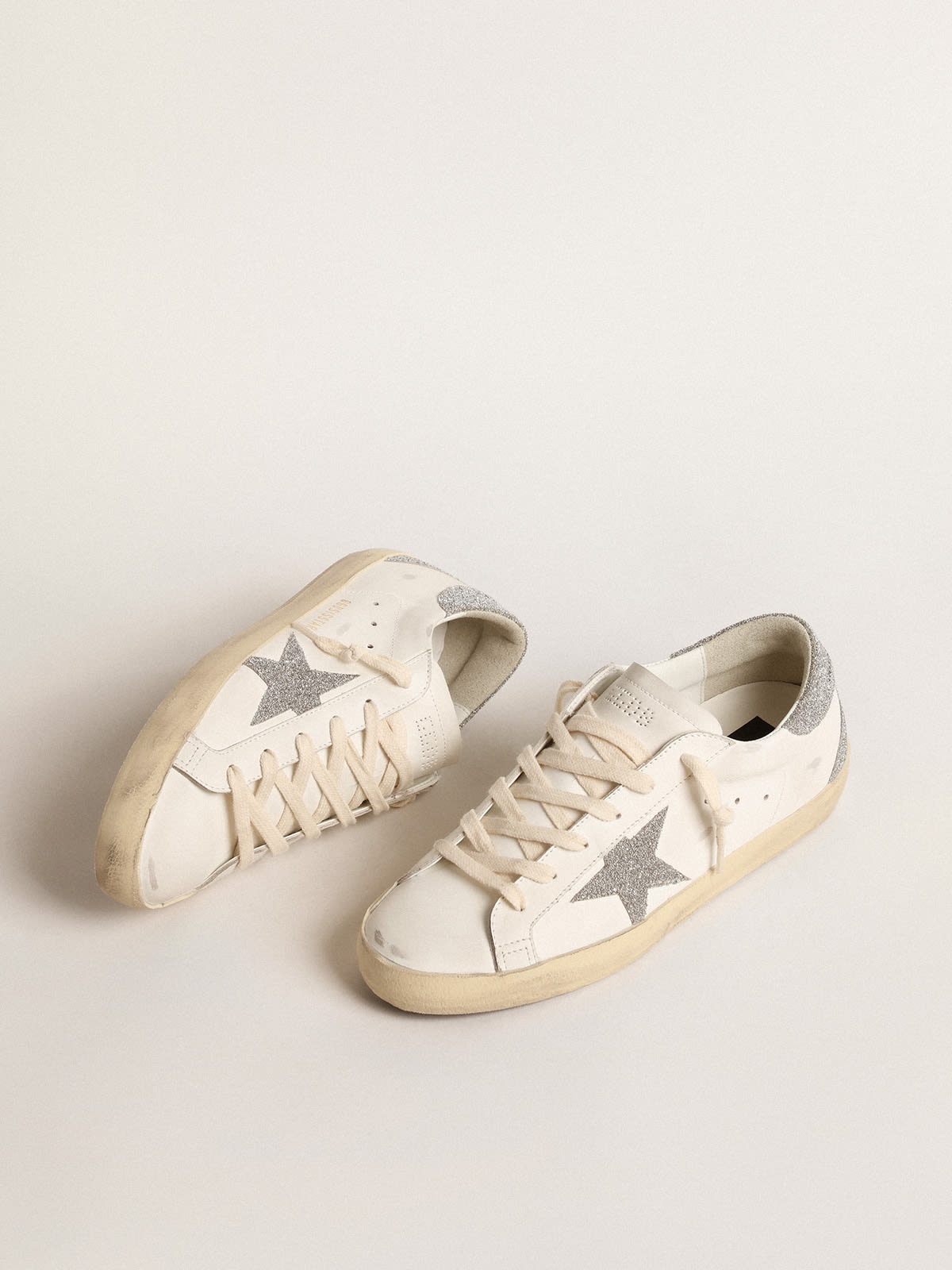 Golden Goose Super-Star with a silver Swarovski crystal star and heel tab |  REVERSIBLE