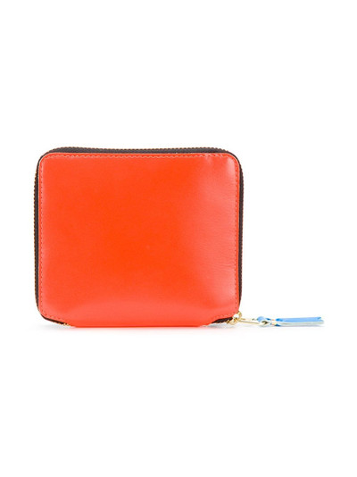 Comme Des Garçons neon glow wallet outlook