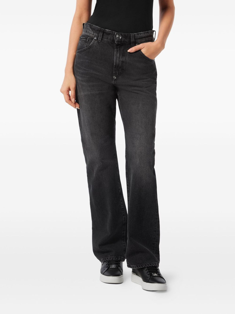 whiskering-effect jeans 3