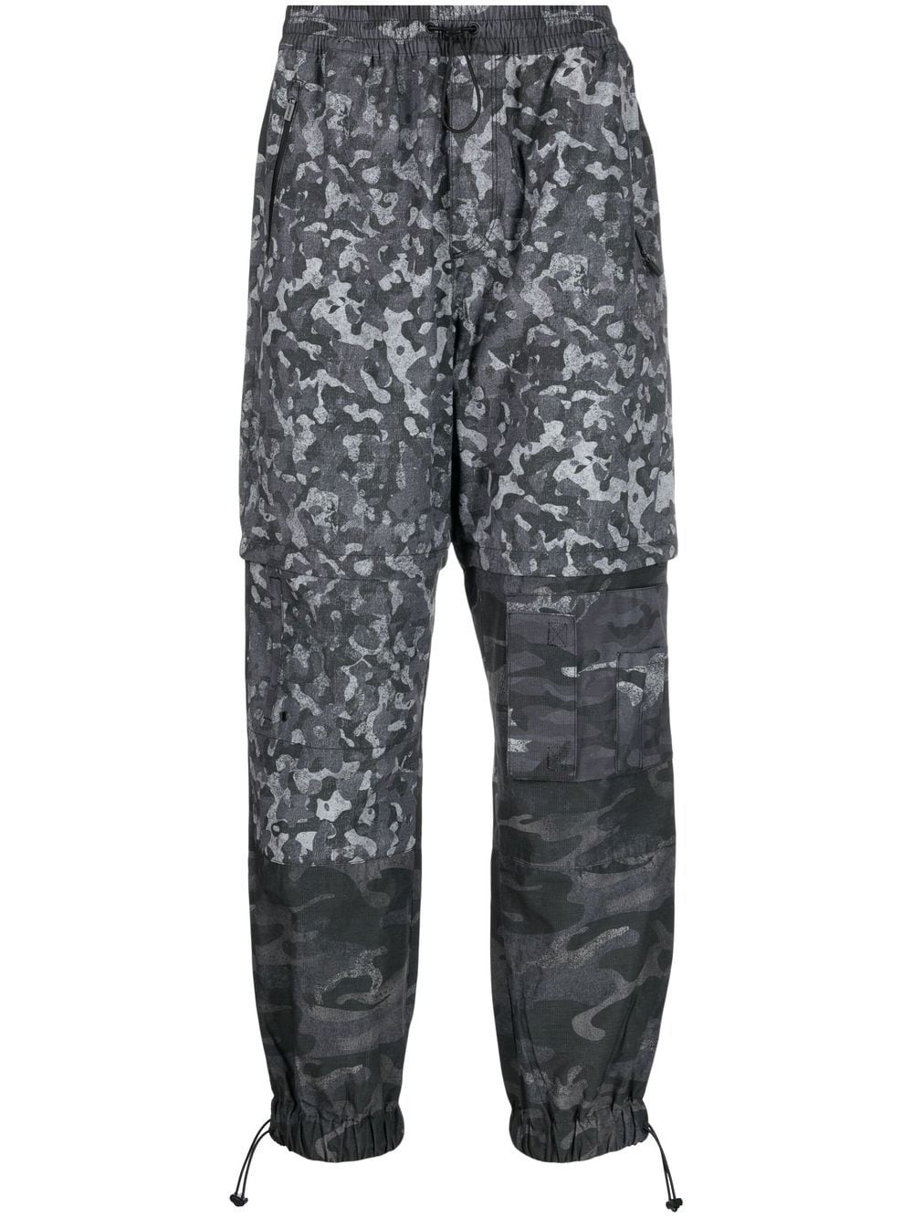 camouflage-print performance trousers - 1