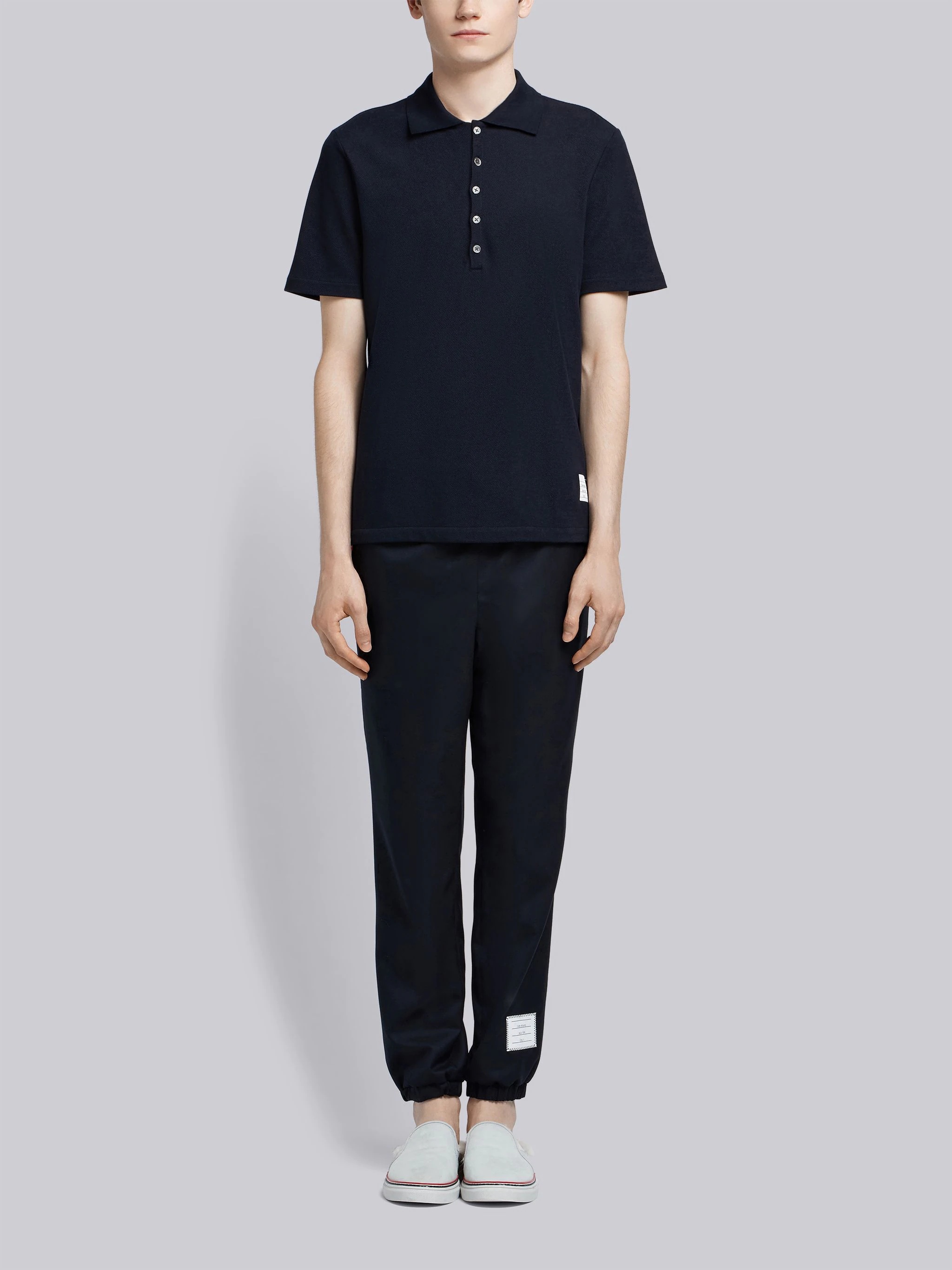 【THOM BROWNE】 Pique Center Back Stripe Relaxed Fit Polo Classic Pique Relaxed Fit Center Back Stripe Polo | Thom Browne