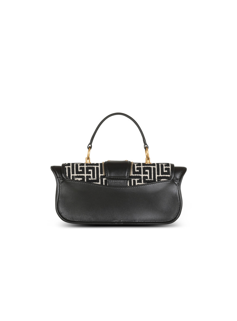 Blaze leather clutch bag with jacquard monogram 4