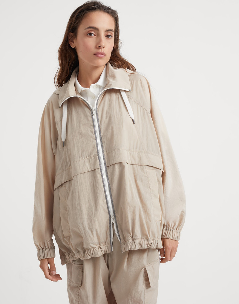 Wrinkled cloth hooded outerwear with precious trims 1