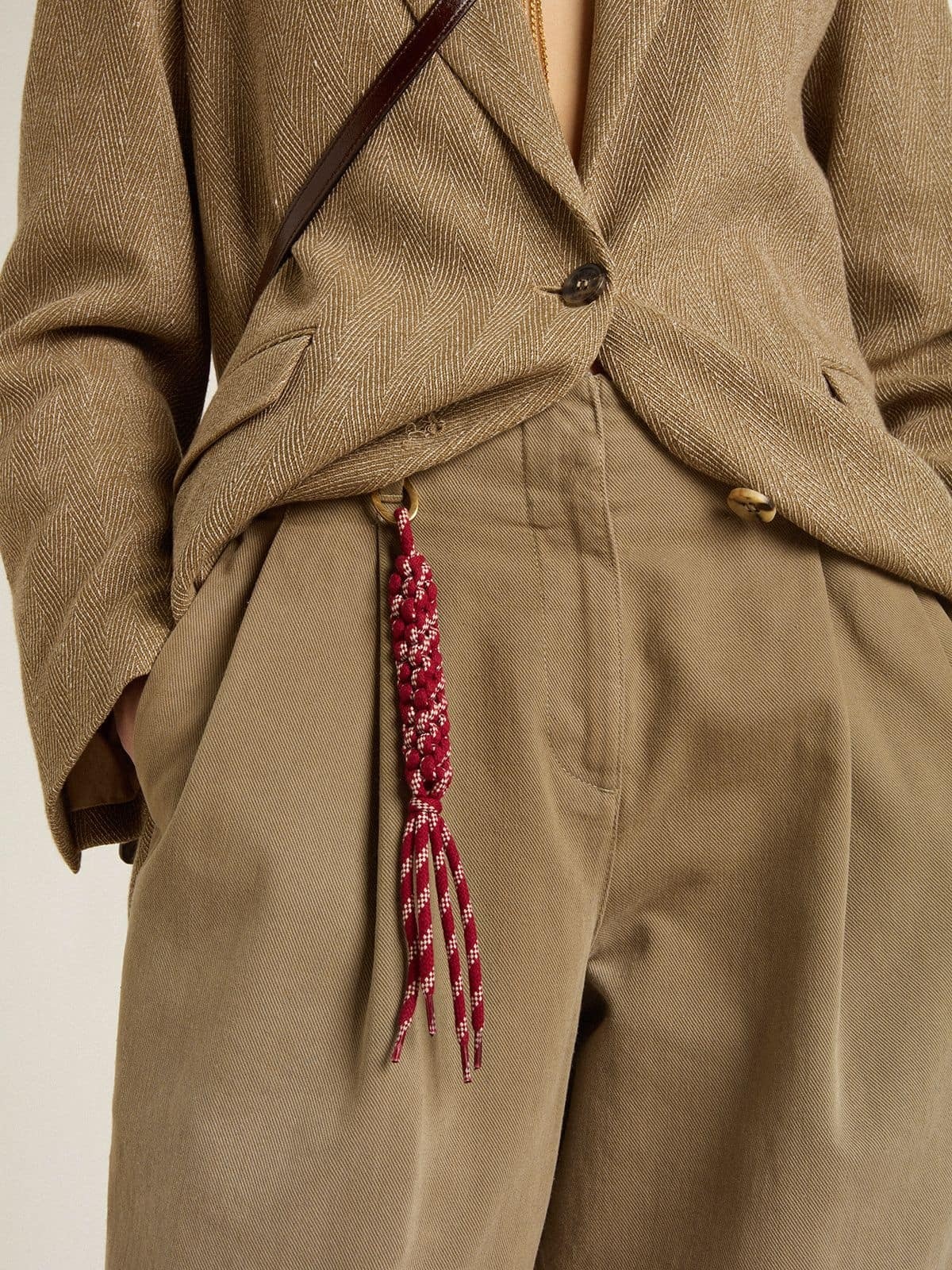 Charm with red knotted laces - 3