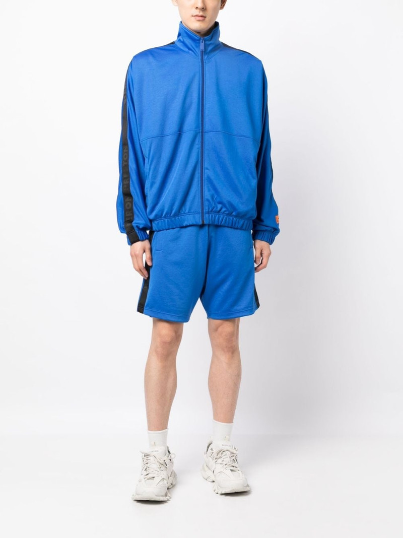 Heron Preston logo-patch track shorts outlook